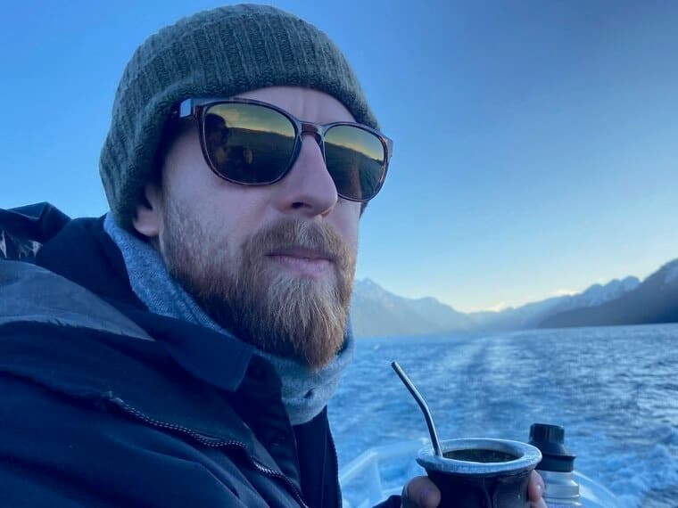 Sam on a boat in Bariloche, drinking mate
