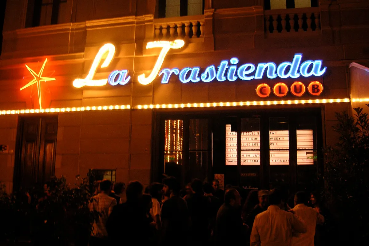 The neon La Trastienda Club sign over the door in San Telmo