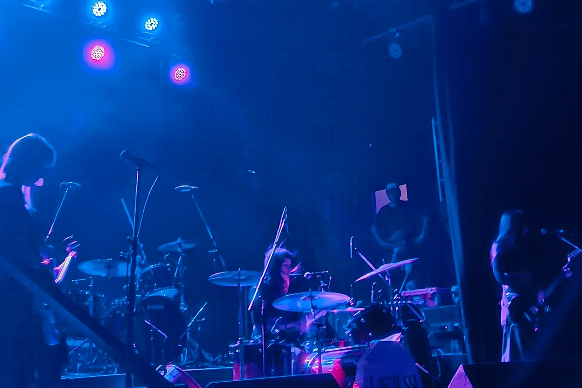 A band playing at Niceto Club under blue stage light