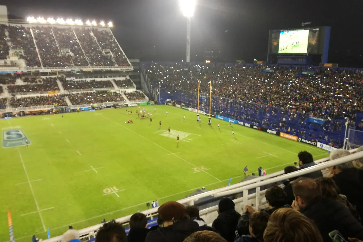 The floodlit pitch and blue stands of Vélez Sarsfield's Estadio José Amalfitani