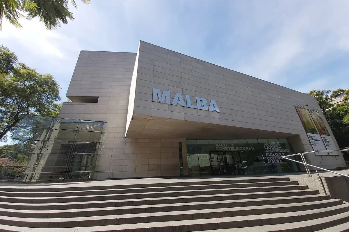 The pale stone facade and front steps of MALBA in Palermo